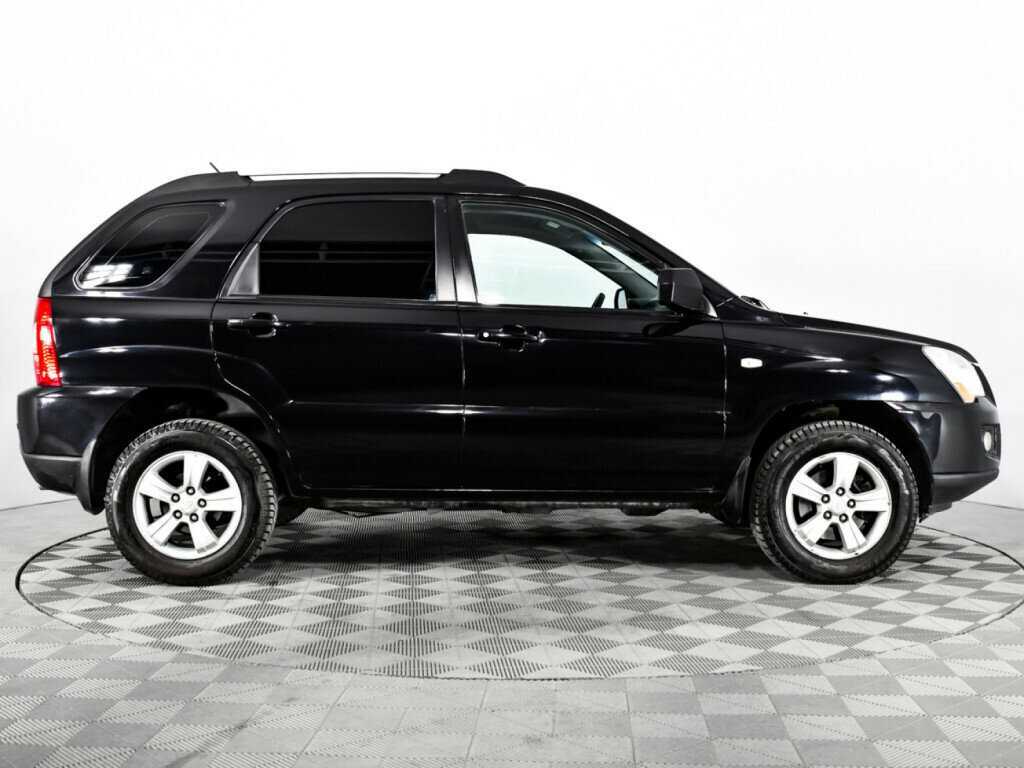 Kia Sportage с пробегом — 2009 год. Фото: #3