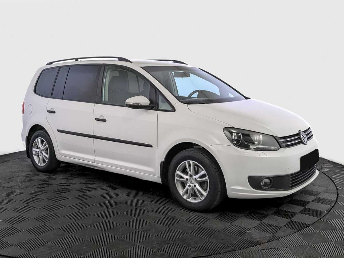 Volkswagen Touran с пробегом — 2012 год. Фото: #2