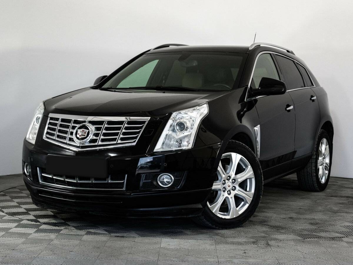 Cadillac SRX с пробегом — 2014 год. Посмотреть фото