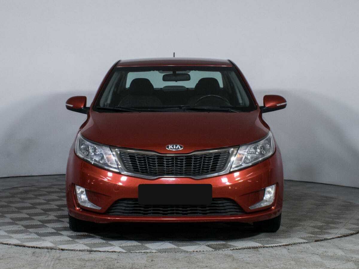 Kia Rio с пробегом — 2013 год. Фото: #1