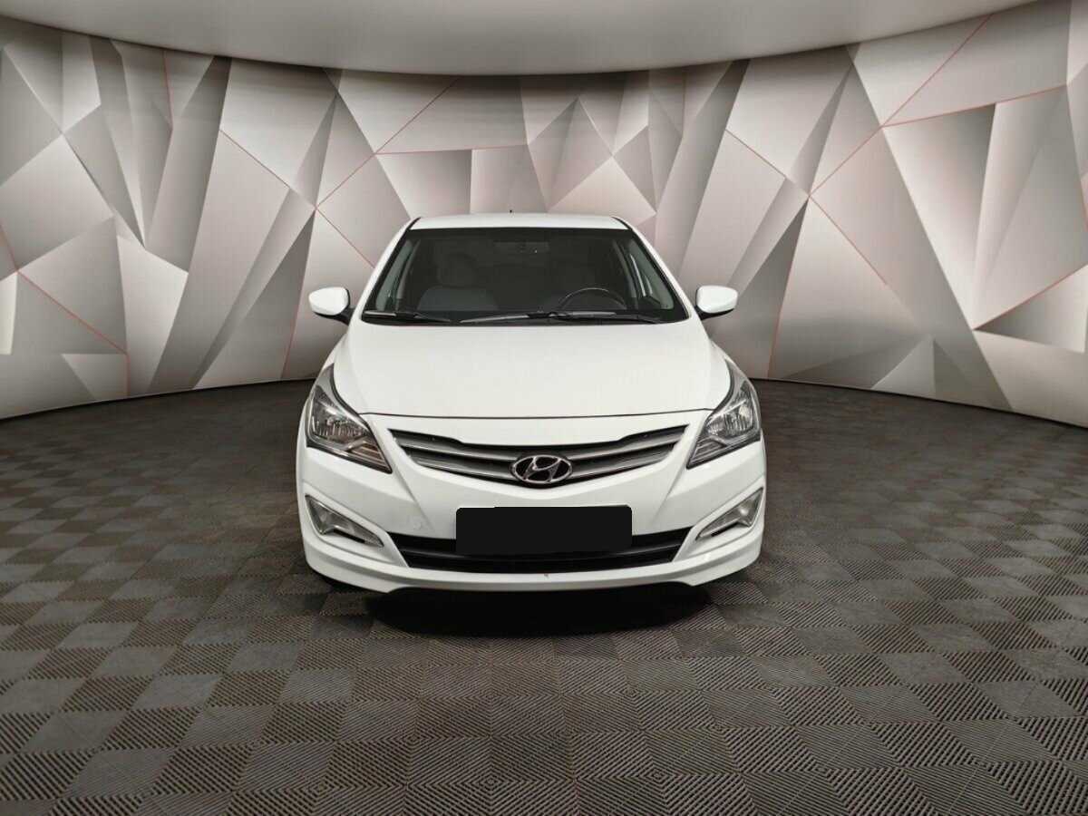 Hyundai Solaris с пробегом — 2014 год. Фото: #6
