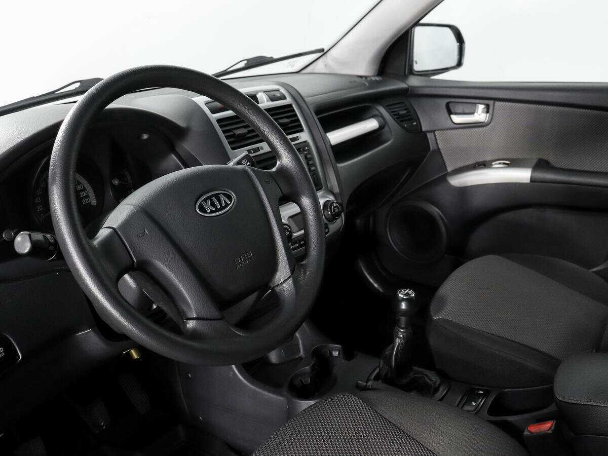 Kia Sportage с пробегом — 2008 год. Фото: #6