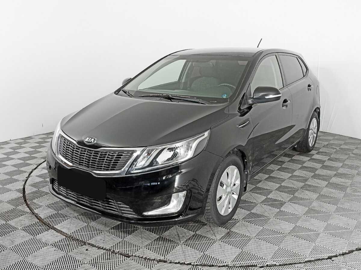 Kia Rio с пробегом — 2015 год. Фото: #0