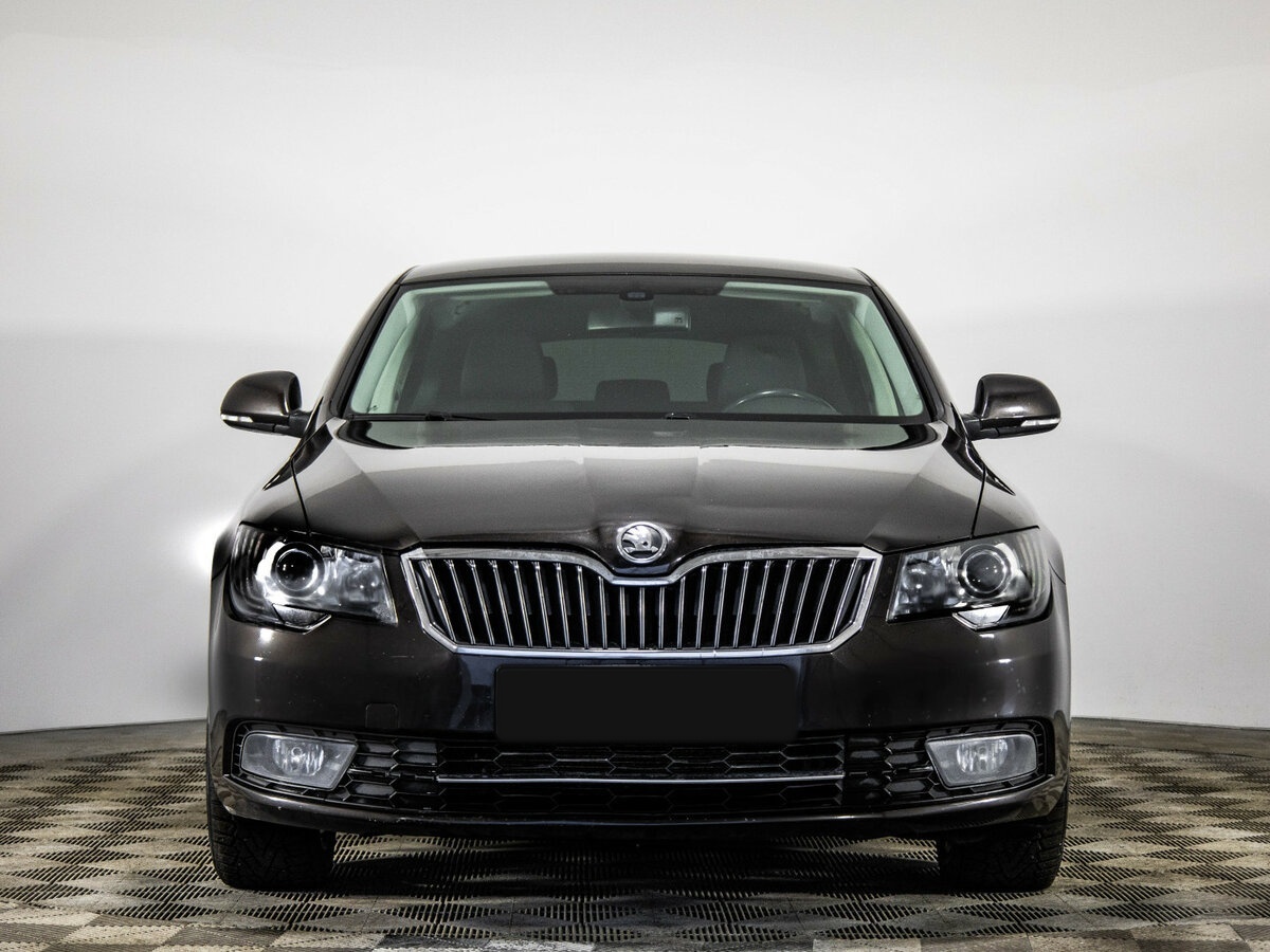Skoda Superb с пробегом — 2014 год. Фото: #1