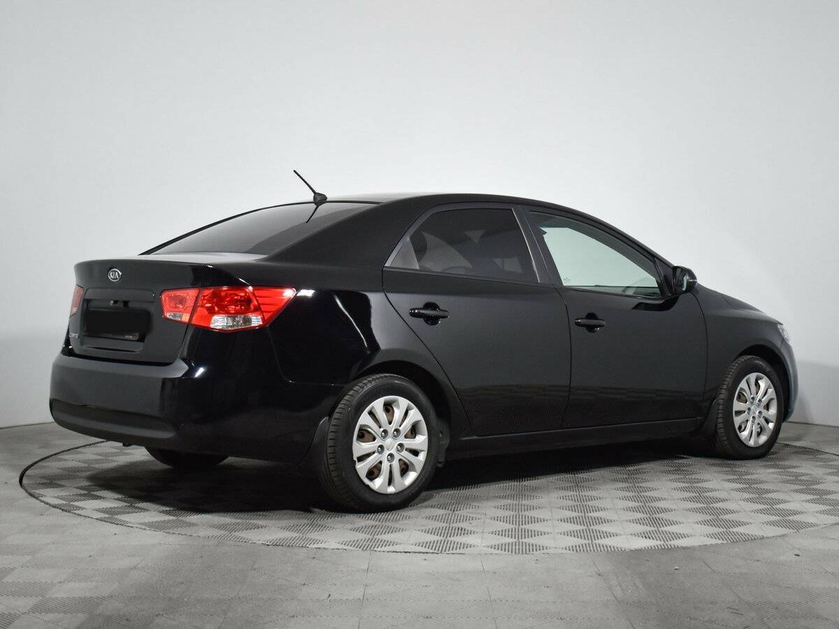 Kia Cerato с пробегом — 2011 год. Фото: #4