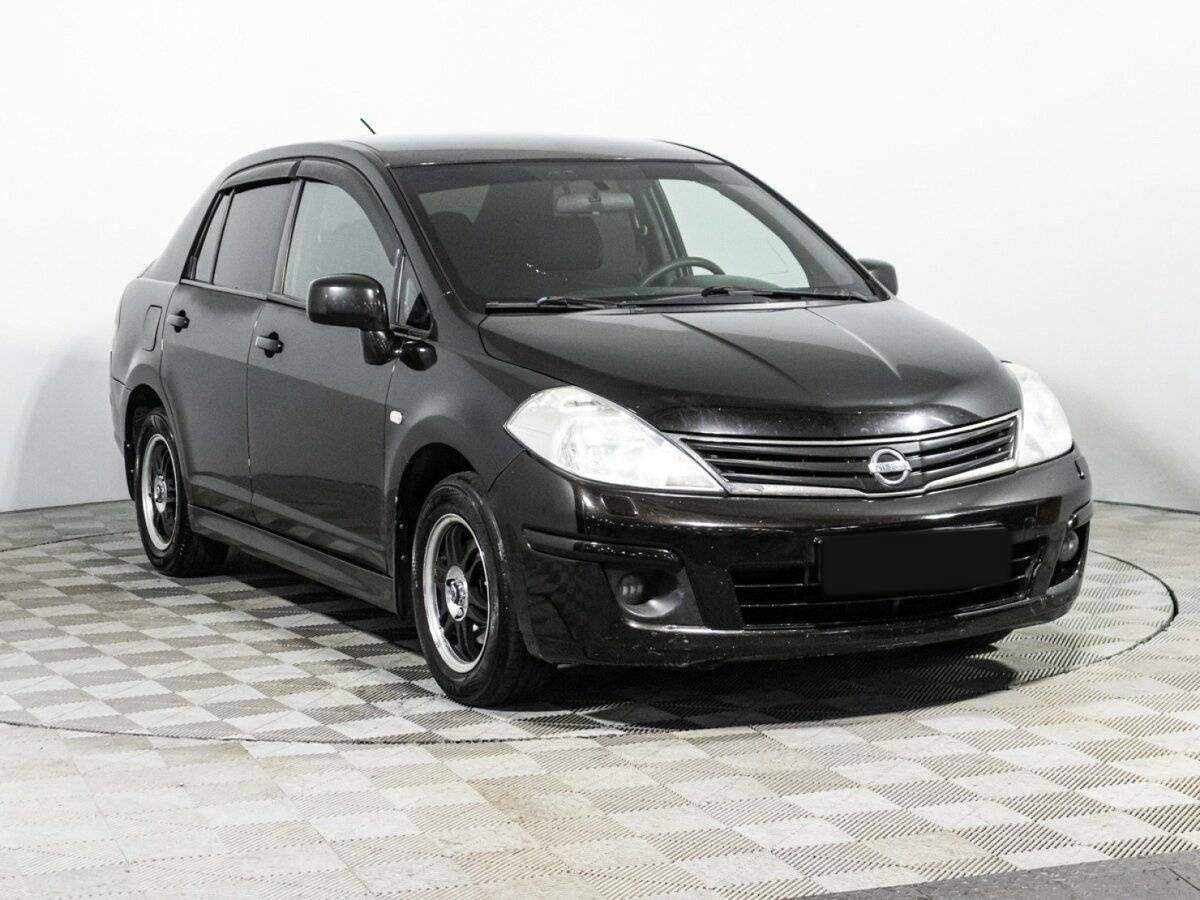 Nissan Tiida с пробегом — 2010 год. Фото: #2