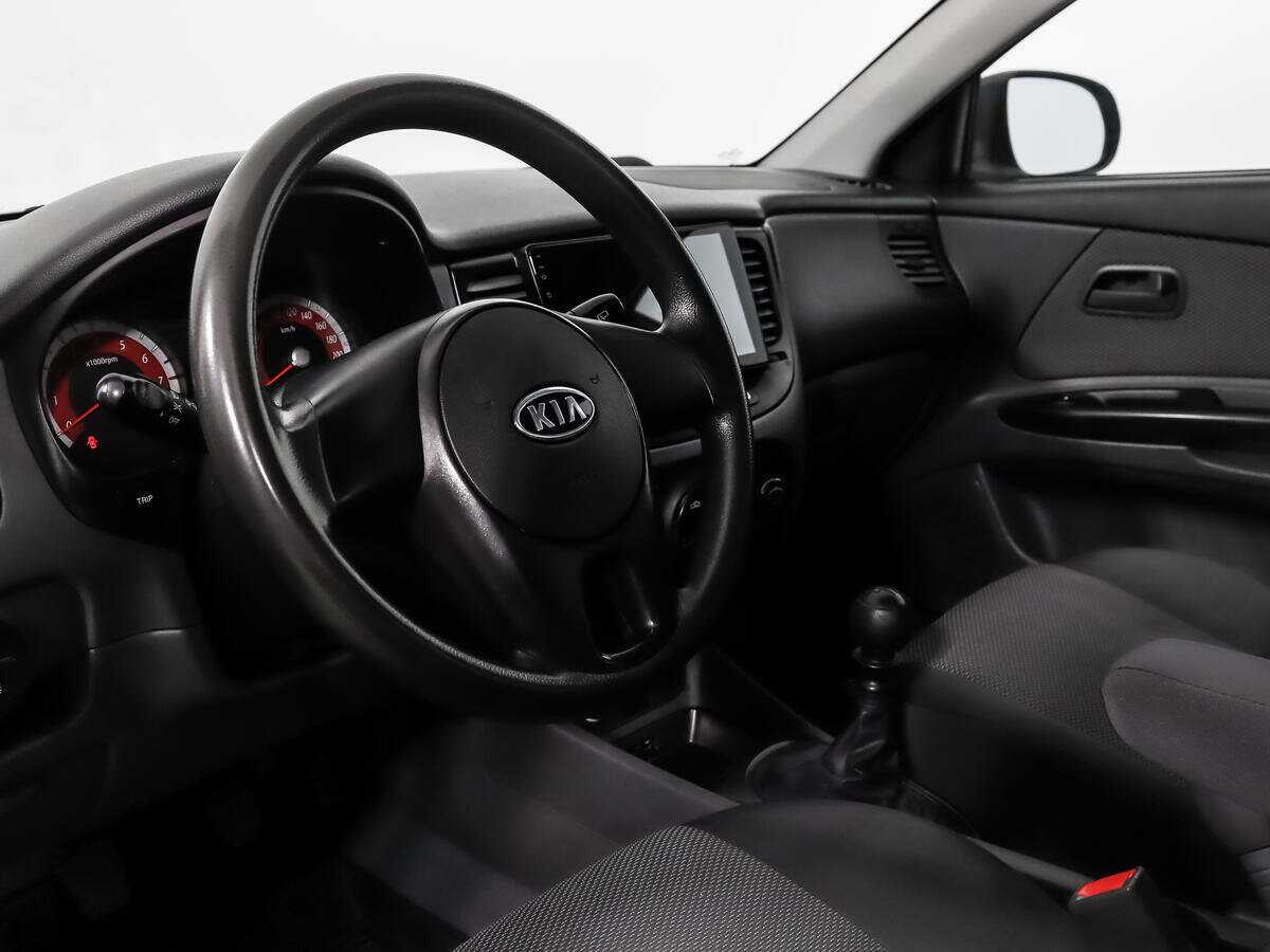 Kia Rio с пробегом — 2011 год. Фото: #8