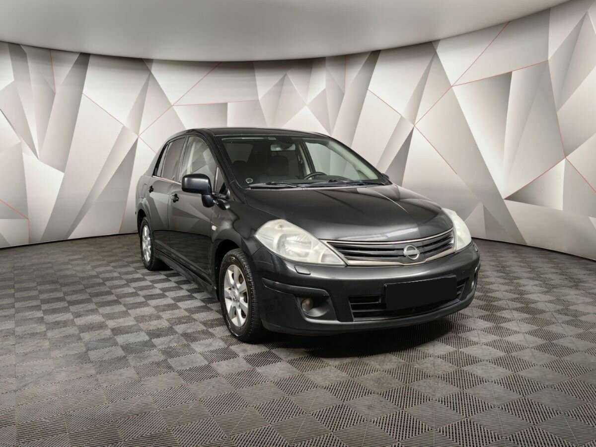 Nissan Tiida с пробегом — 2010 год. Фото: #2