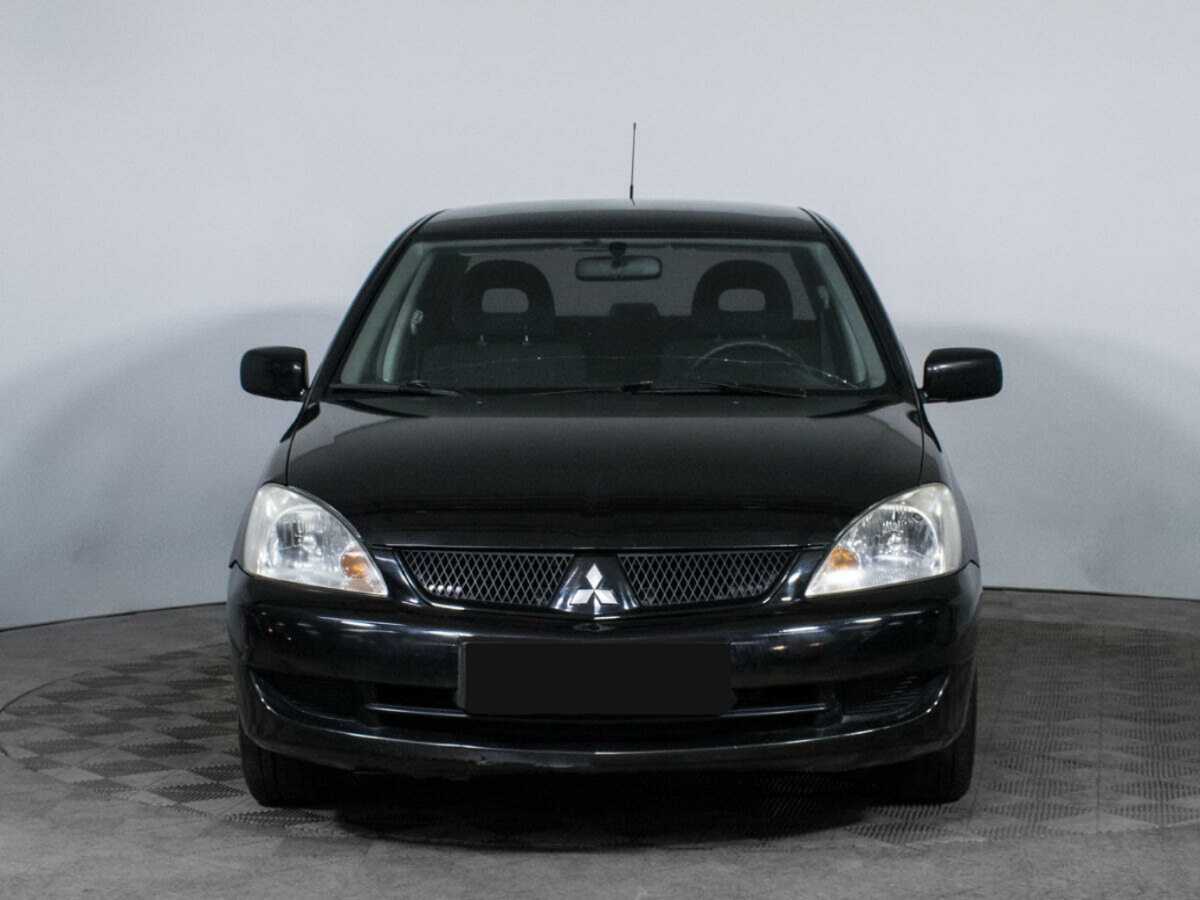 Mitsubishi Lancer с пробегом — 2009 год. Фото: #1