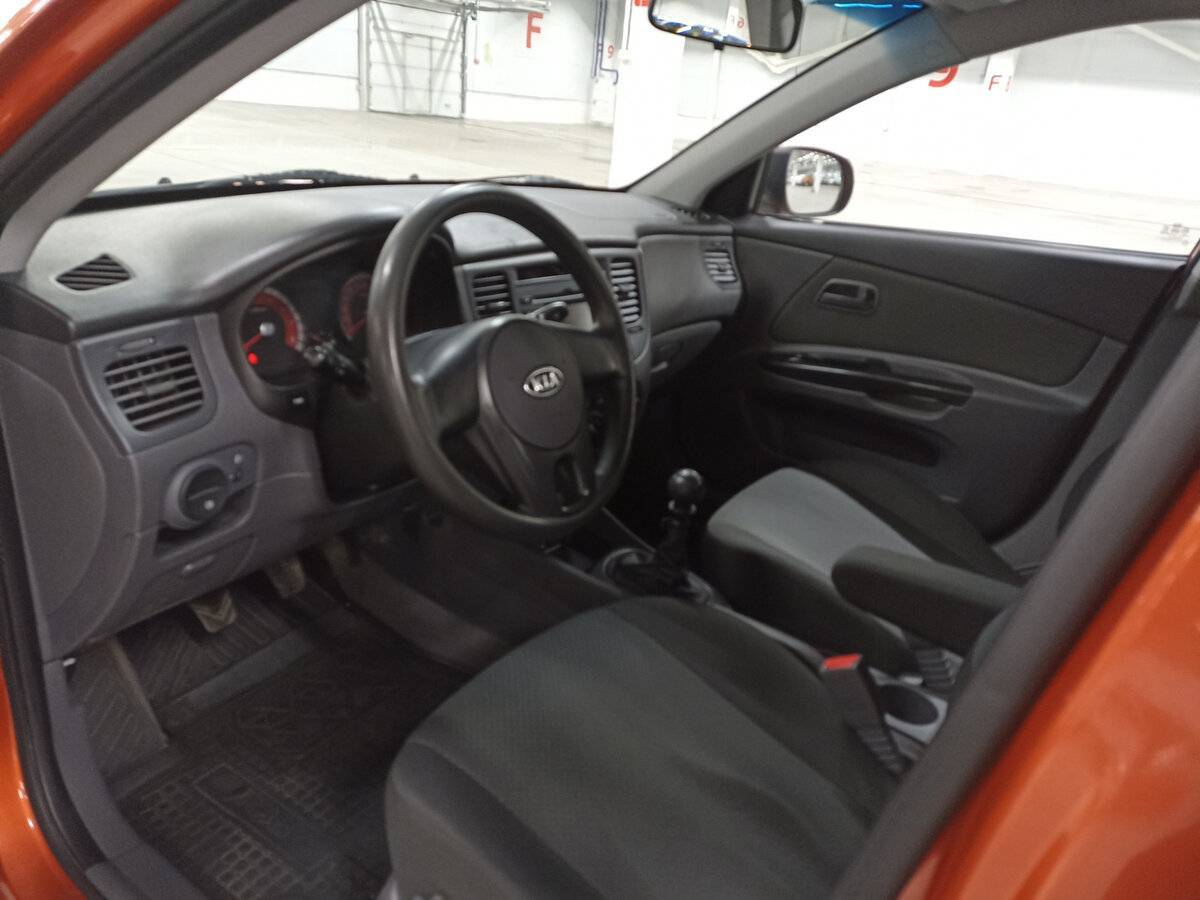 Kia Rio с пробегом — 2011 год. Фото: #15