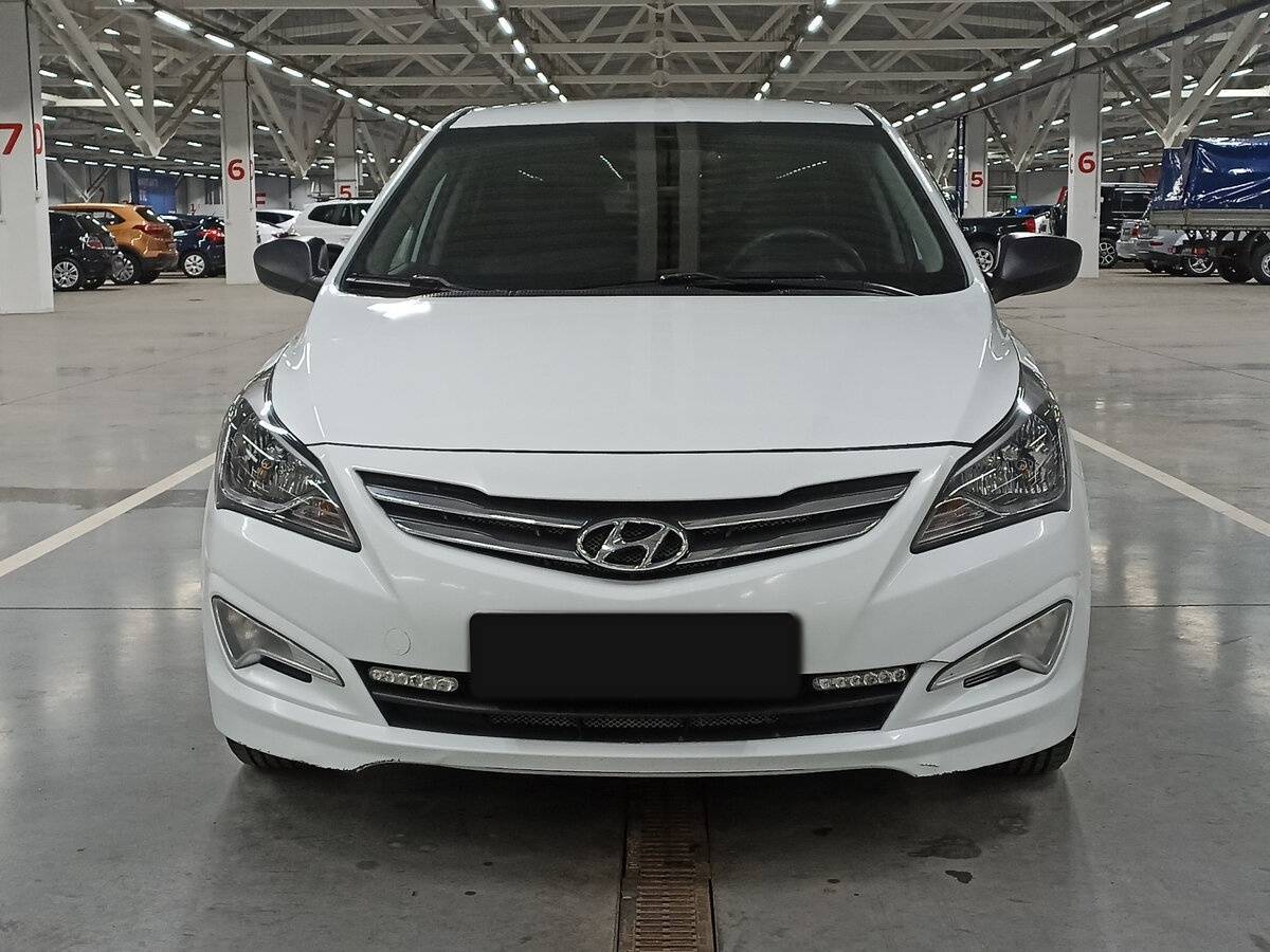 Hyundai Solaris с пробегом — 2015 год. Фото: #1