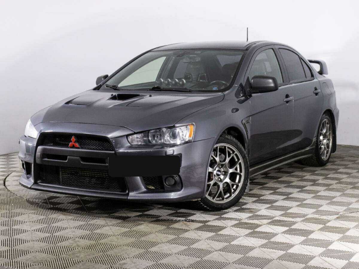 Mitsubishi Lancer Evolution с пробегом — 2011 год. Посмотреть фото