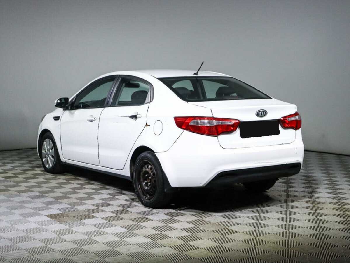 Kia Rio с пробегом — 2014 год. Фото: #6