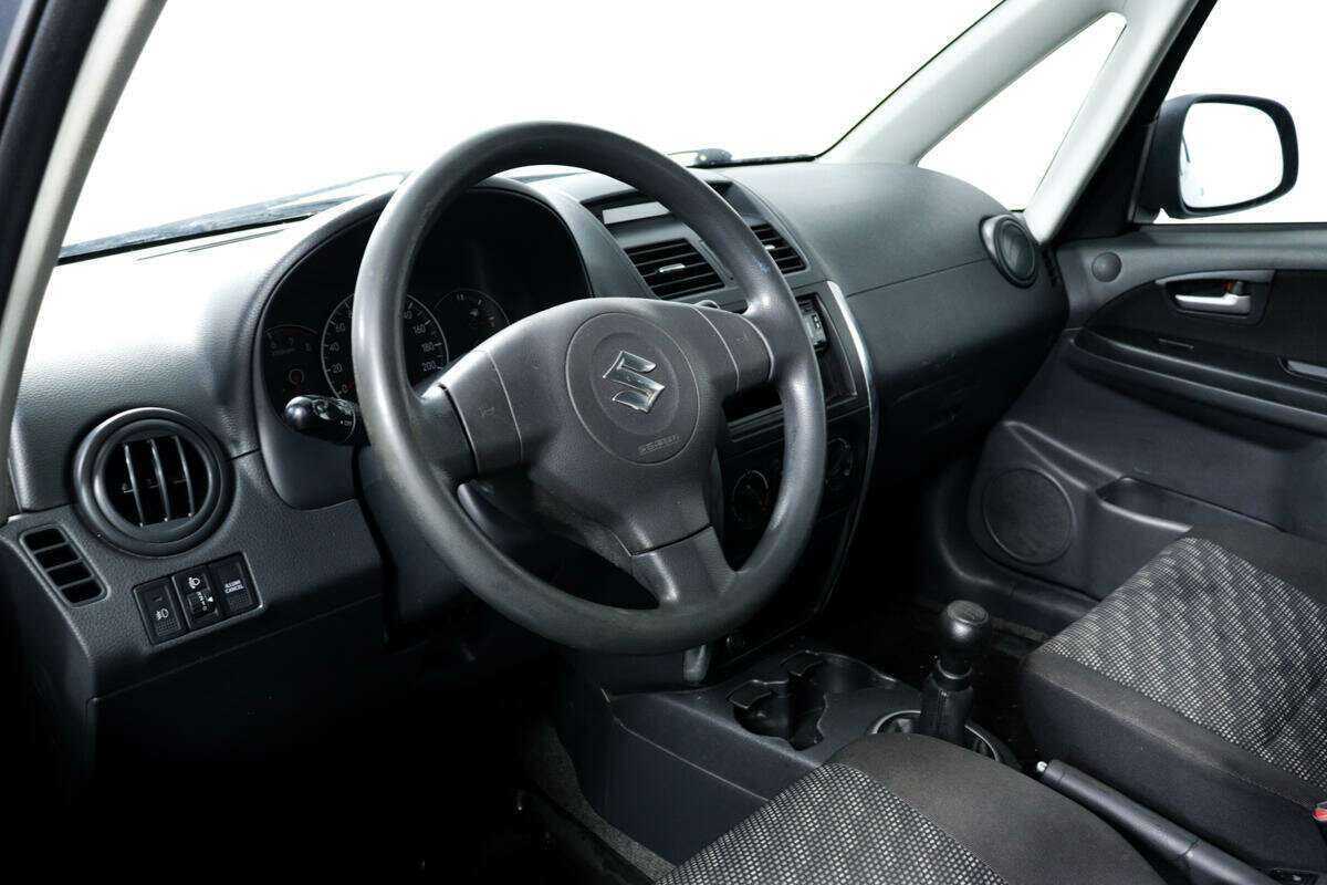 Suzuki SX4 с пробегом — 2008 год. Фото: #12