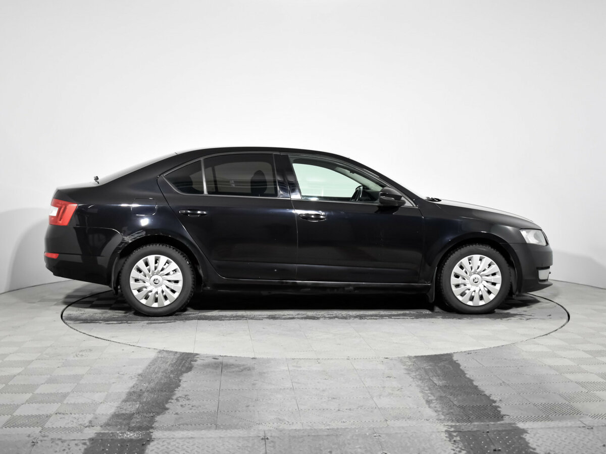 Skoda Octavia с пробегом — 2014 год. Фото: #3