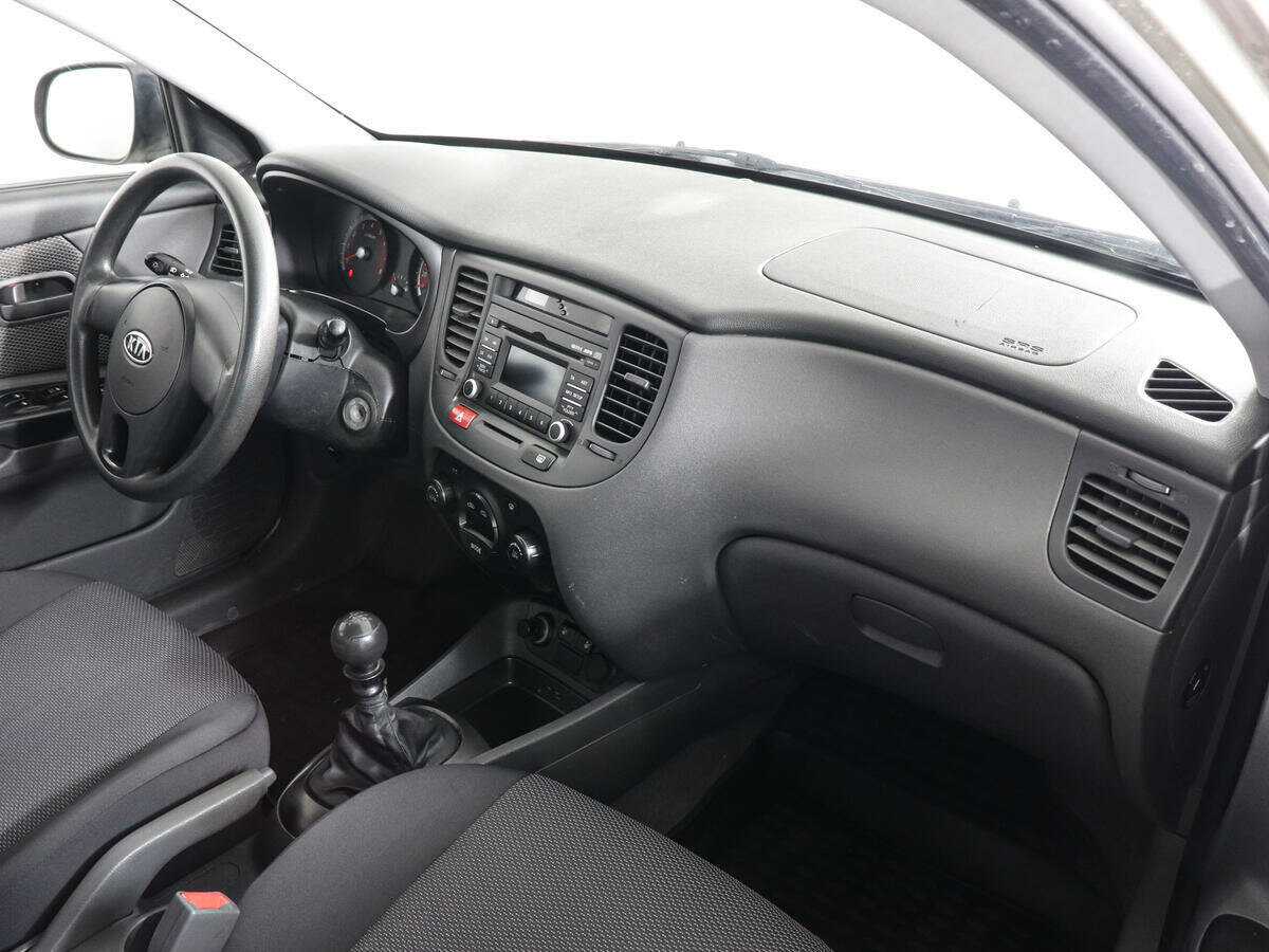 Kia Rio с пробегом — 2010 год. Фото: #5