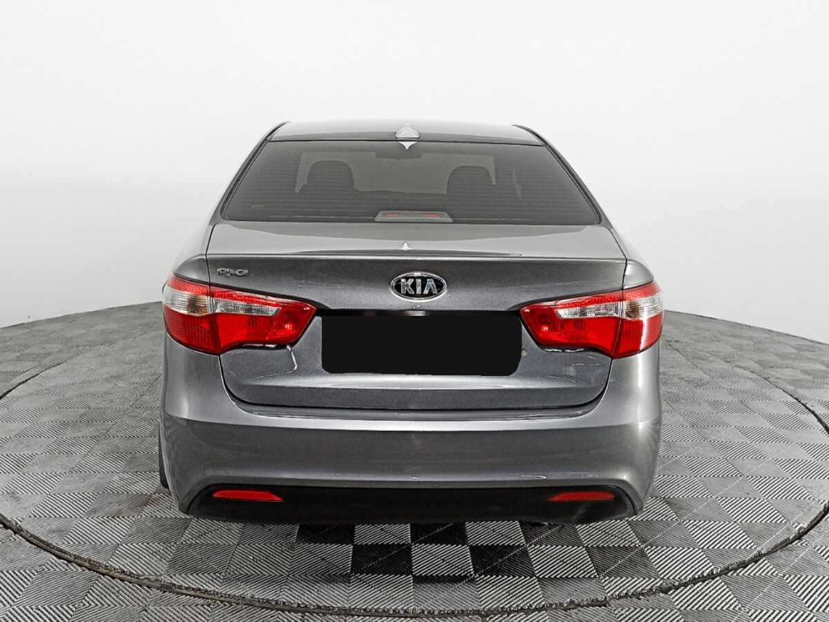 Kia Rio с пробегом — 2013 год. Фото: #3