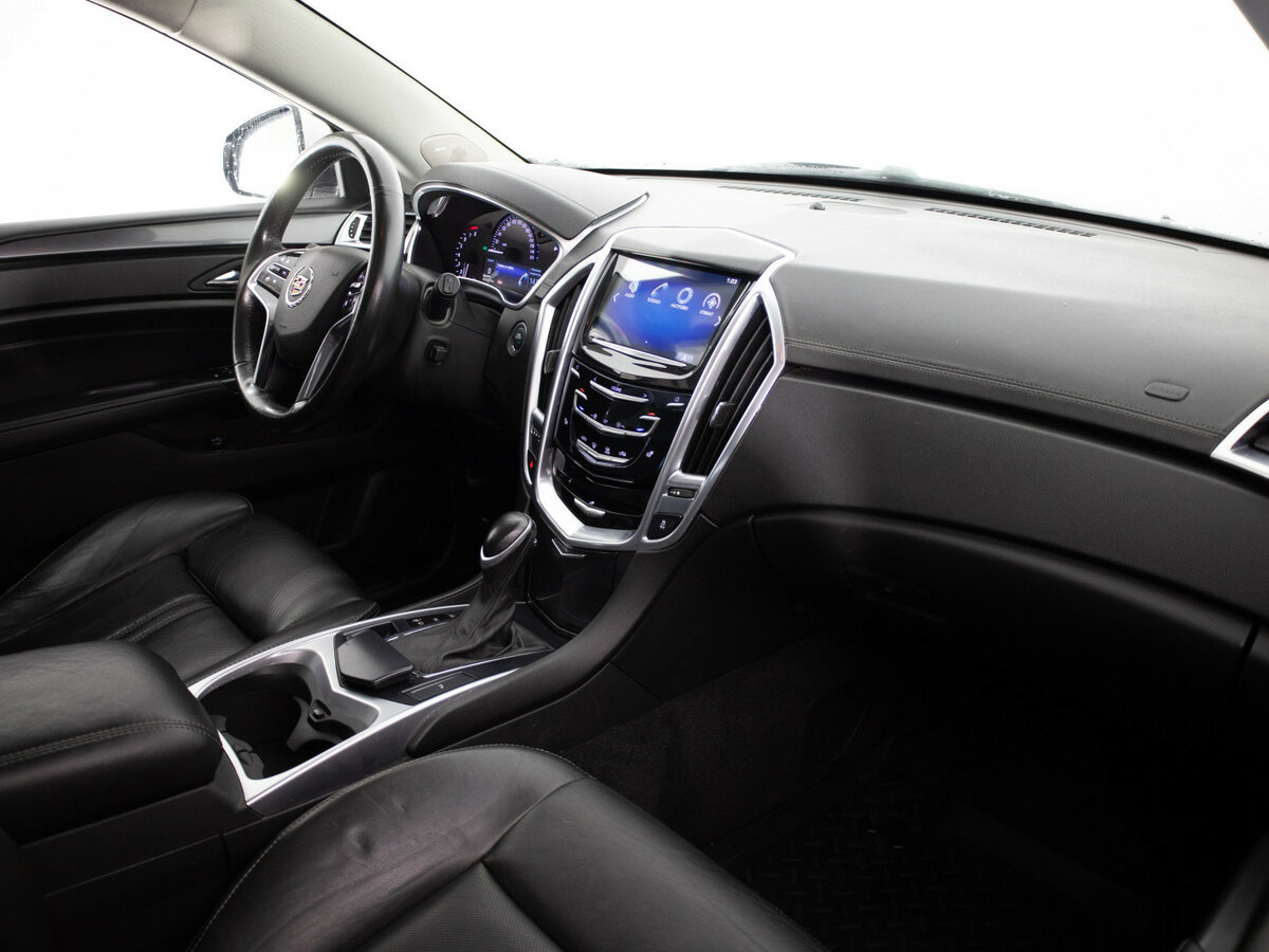 Cadillac SRX с пробегом — 2013 год. Фото: #12