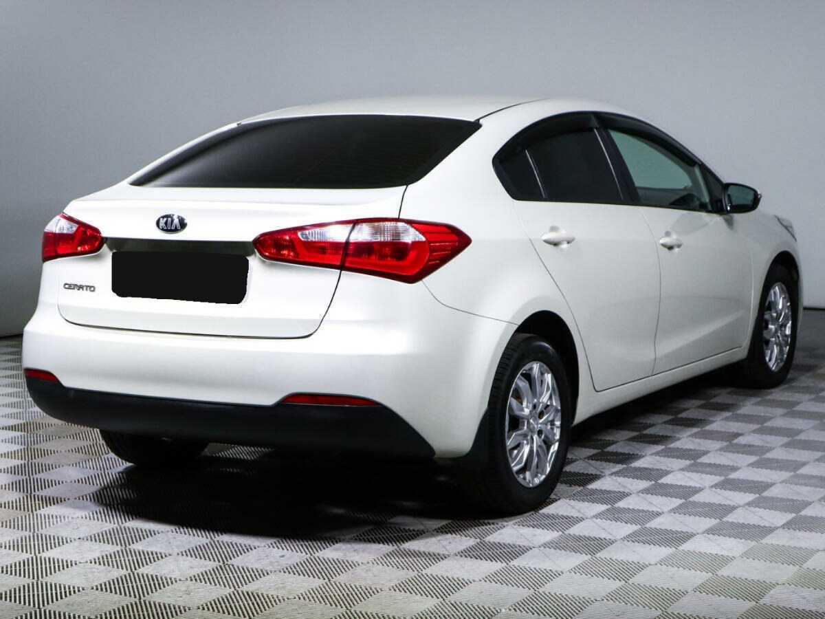 Kia Cerato с пробегом — 2014 год. Фото: #4