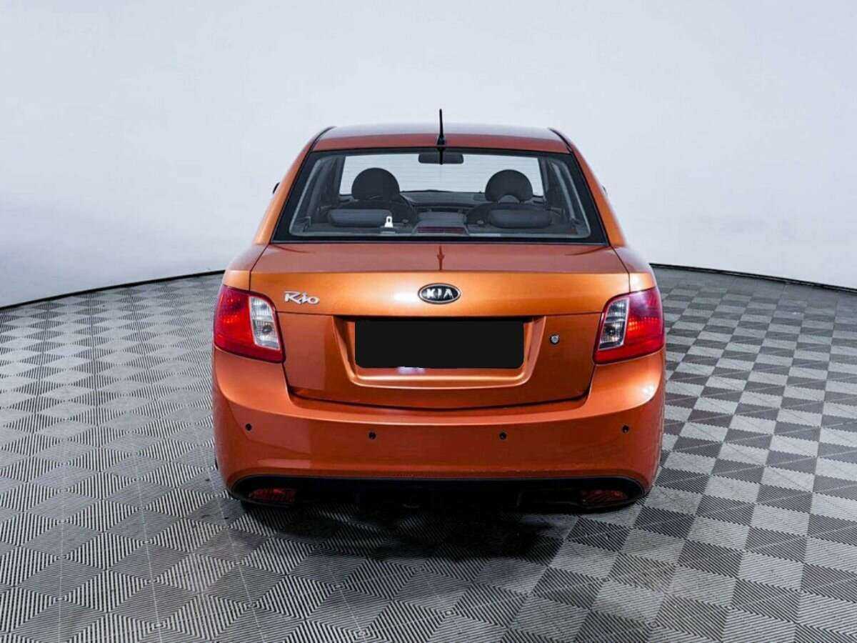 Kia Rio с пробегом — 2011 год. Фото: #5