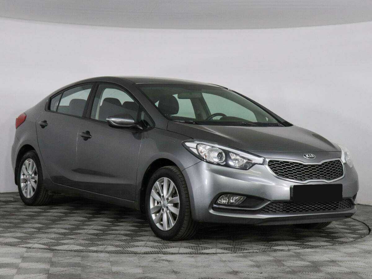 Kia Cerato с пробегом — 2014 год. Фото: #2