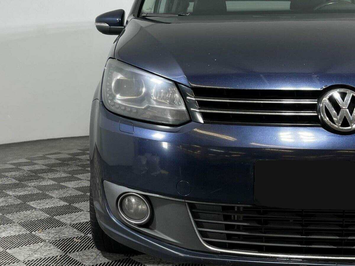 Volkswagen Touran с пробегом — 2012 год. Фото: #15
