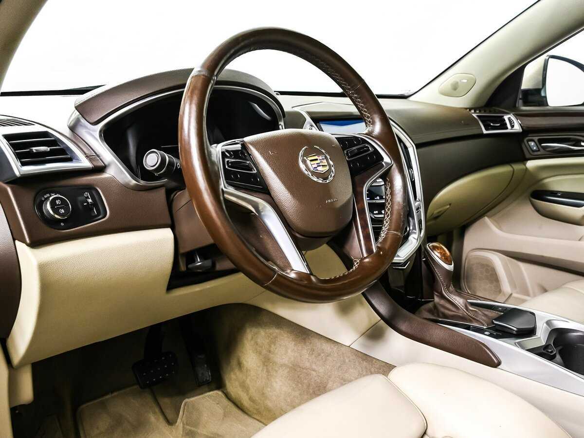 Cadillac SRX с пробегом — 2013 год. Фото: #11