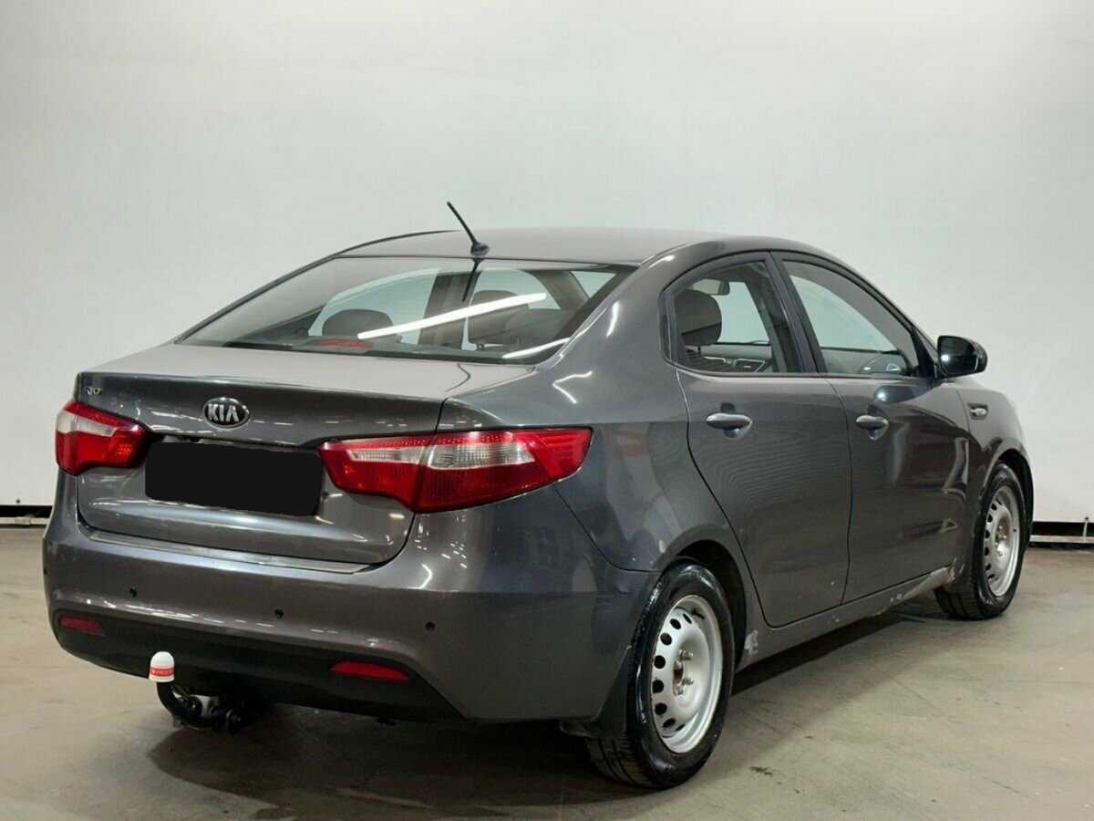 Kia Rio с пробегом — 2013 год. Фото: #4