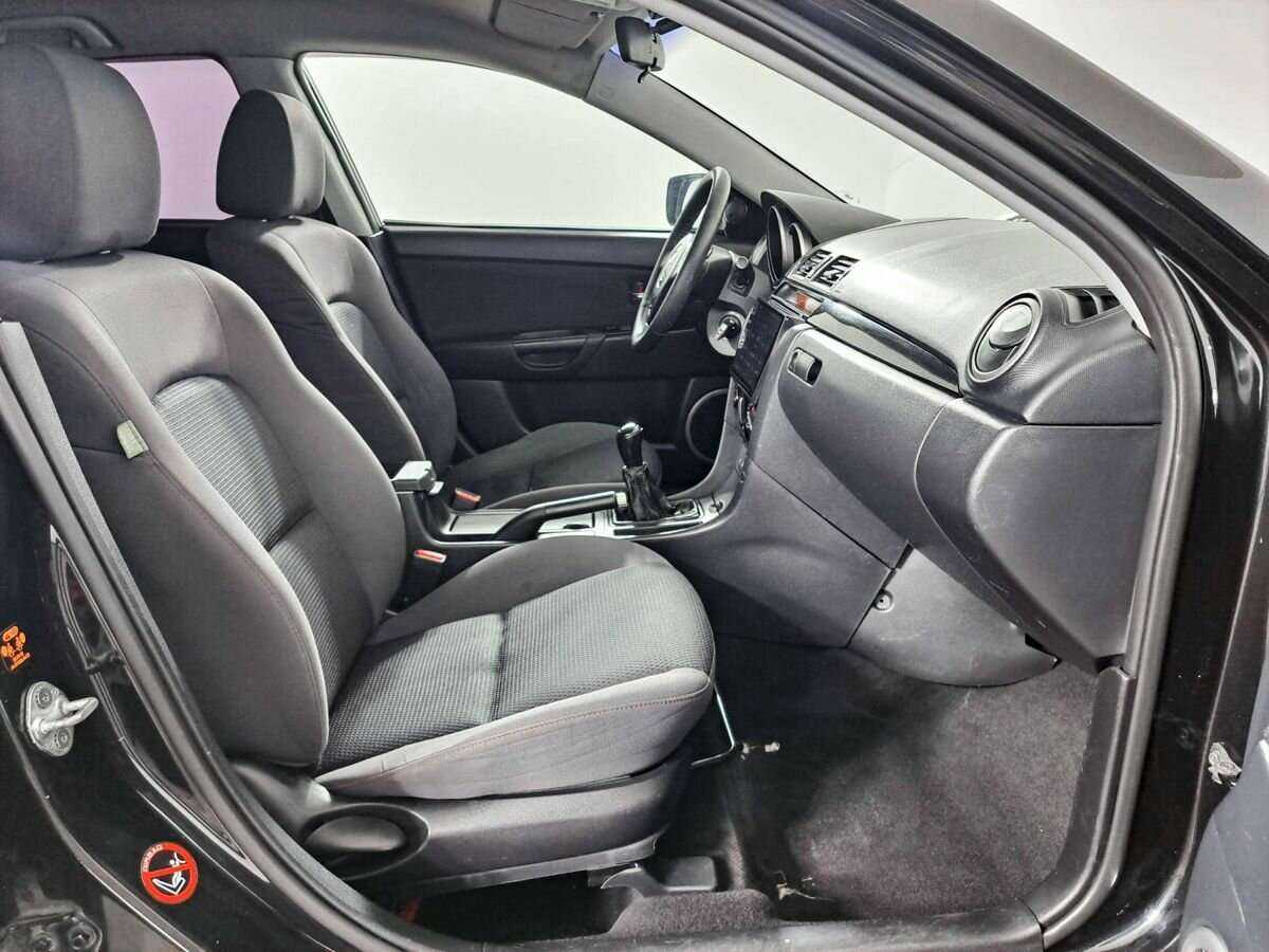 Mazda 3 с пробегом — 2008 год. Фото: #7