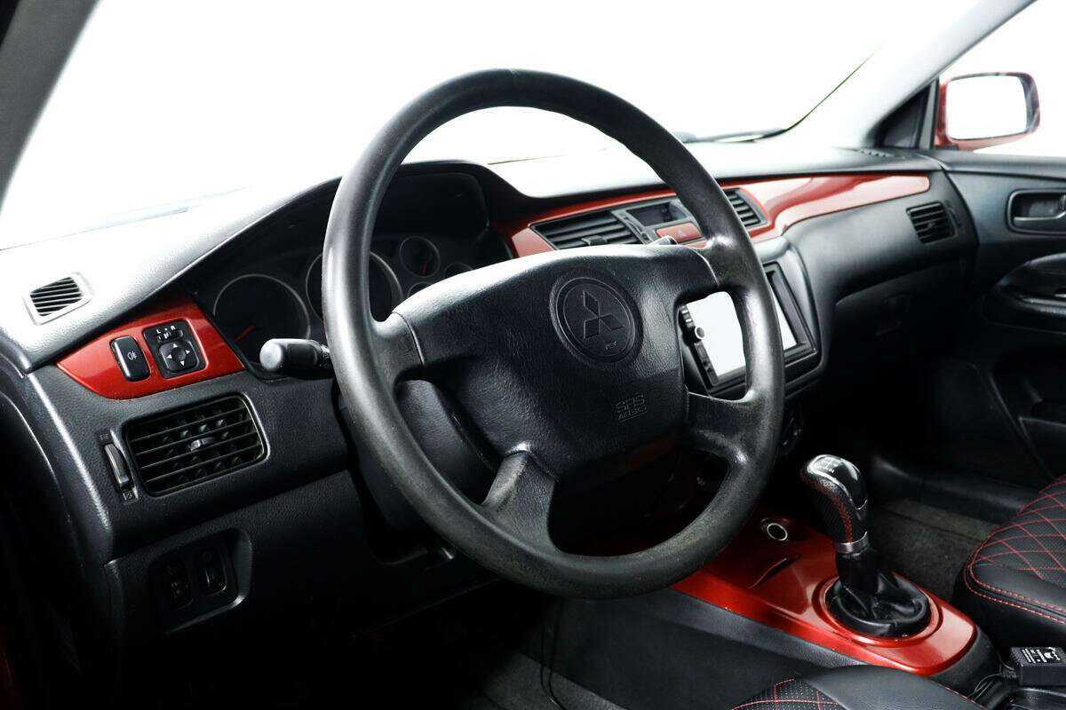 Mitsubishi Lancer с пробегом — 2005 год. Фото: #12