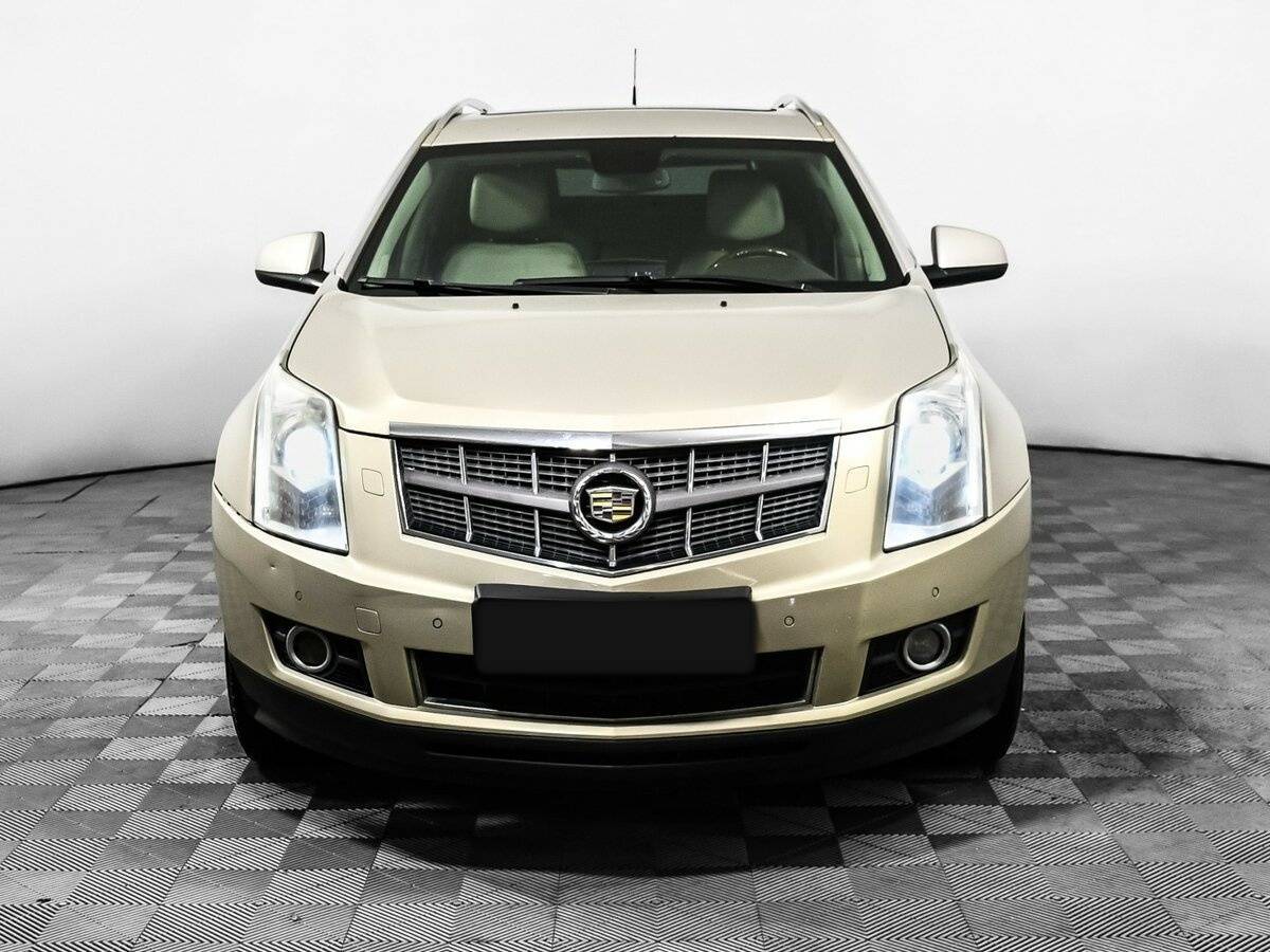 Cadillac SRX с пробегом — 2011 год. Фото: #1