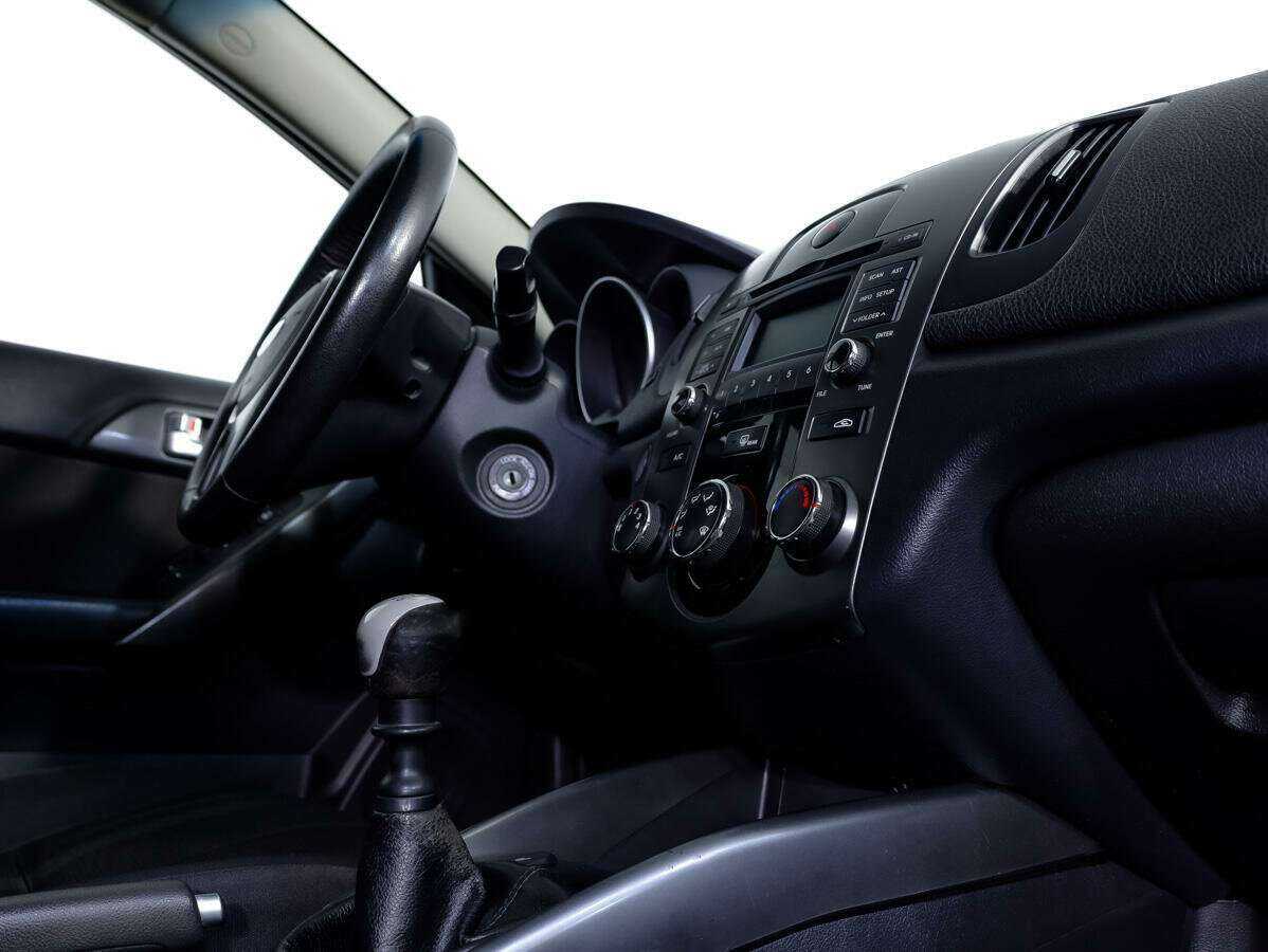 Kia Cerato с пробегом — 2011 год. Фото: #16