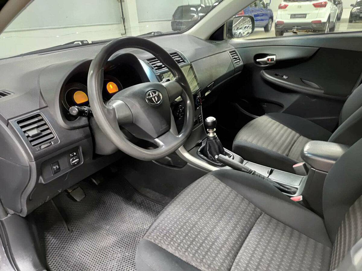 Toyota Corolla с пробегом — 2012 год. Фото: #15