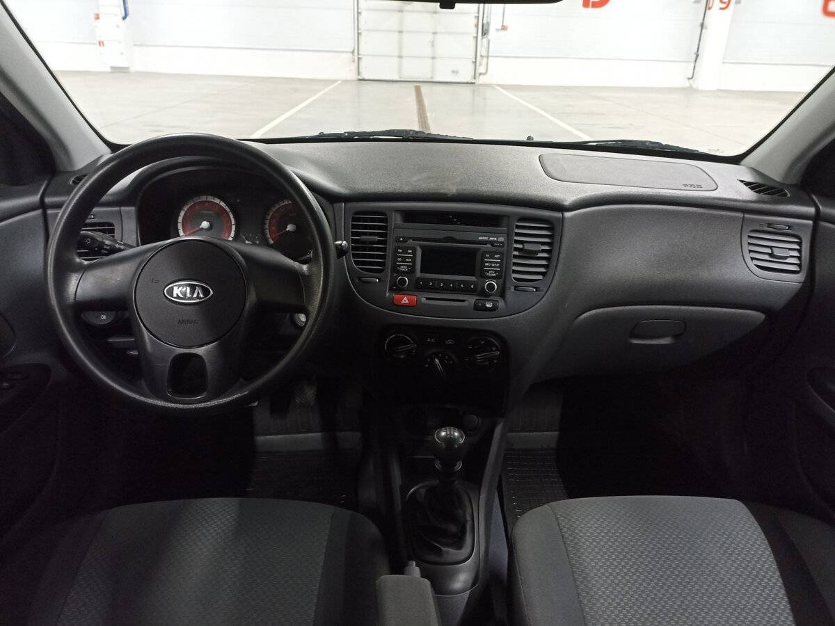 Kia Rio с пробегом — 2011 год. Фото: #13