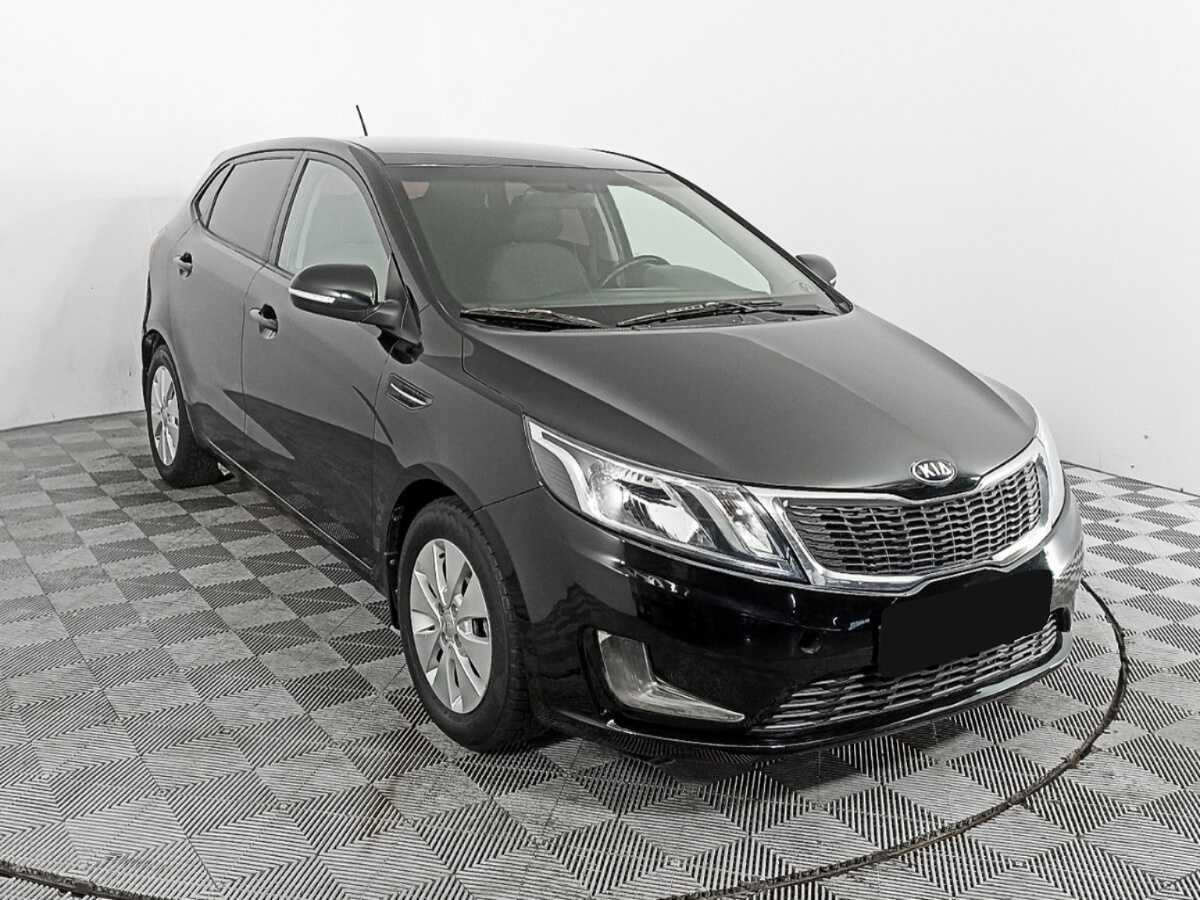 Kia Rio с пробегом — 2015 год. Фото: #2