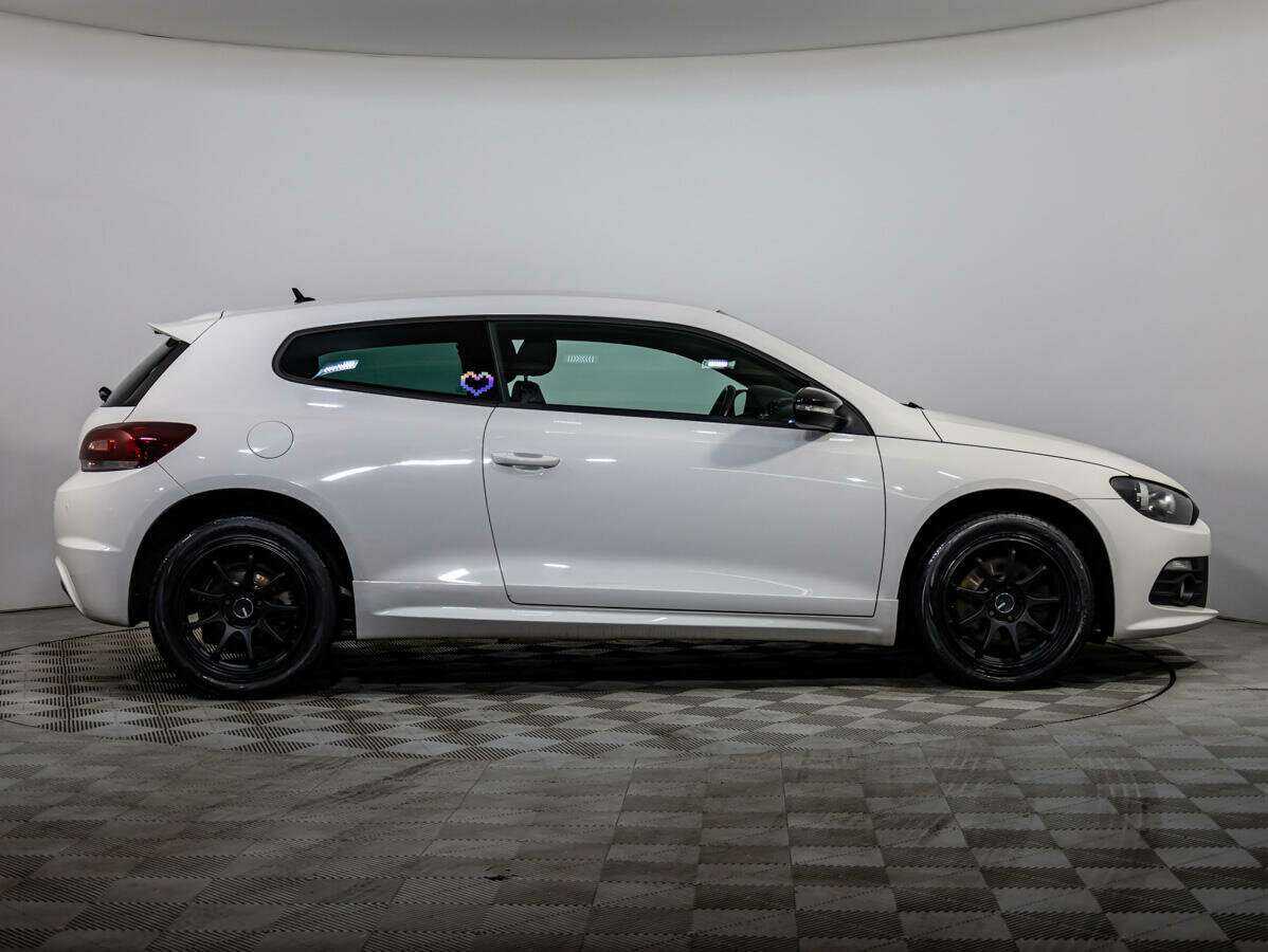 Volkswagen Scirocco с пробегом — 2013 год. Фото: #2