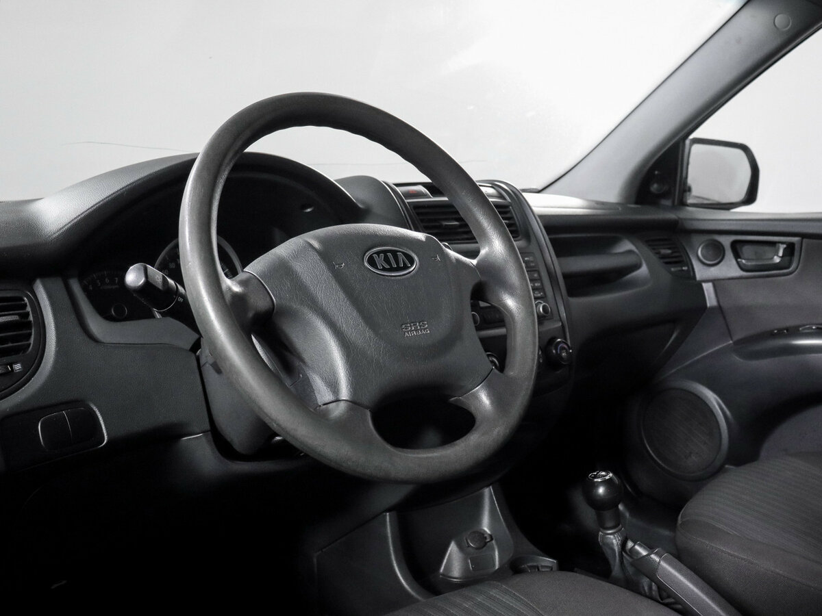 Kia Sportage с пробегом — 2009 год. Фото: #13