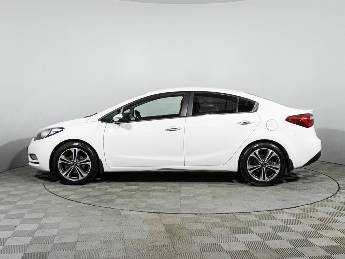 Kia Cerato с пробегом — 2015 год. Фото: #7