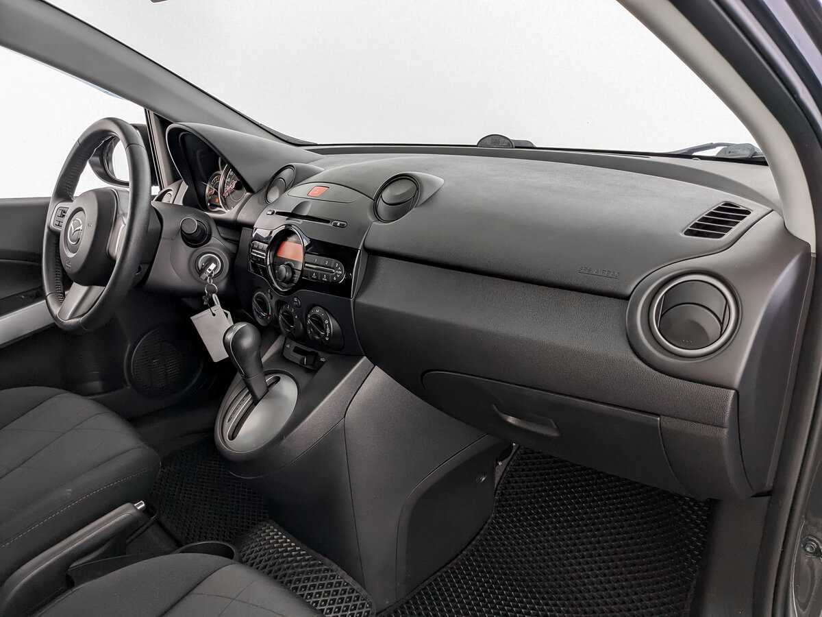 Mazda 2 с пробегом — 2013 год. Фото: #8