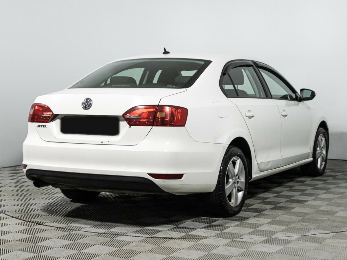 Volkswagen Jetta с пробегом — 2014 год. Фото: #4