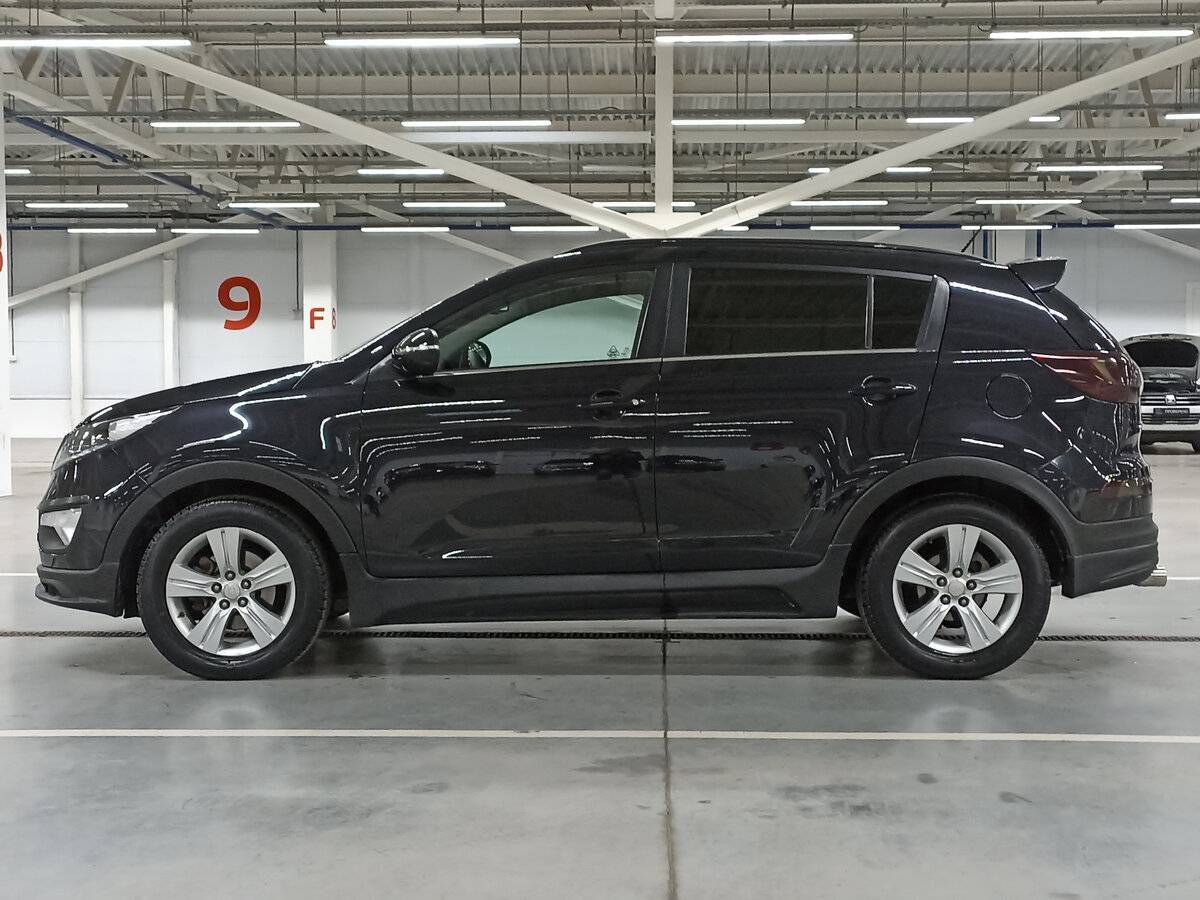 Kia Sportage с пробегом — 2011 год. Фото: #7