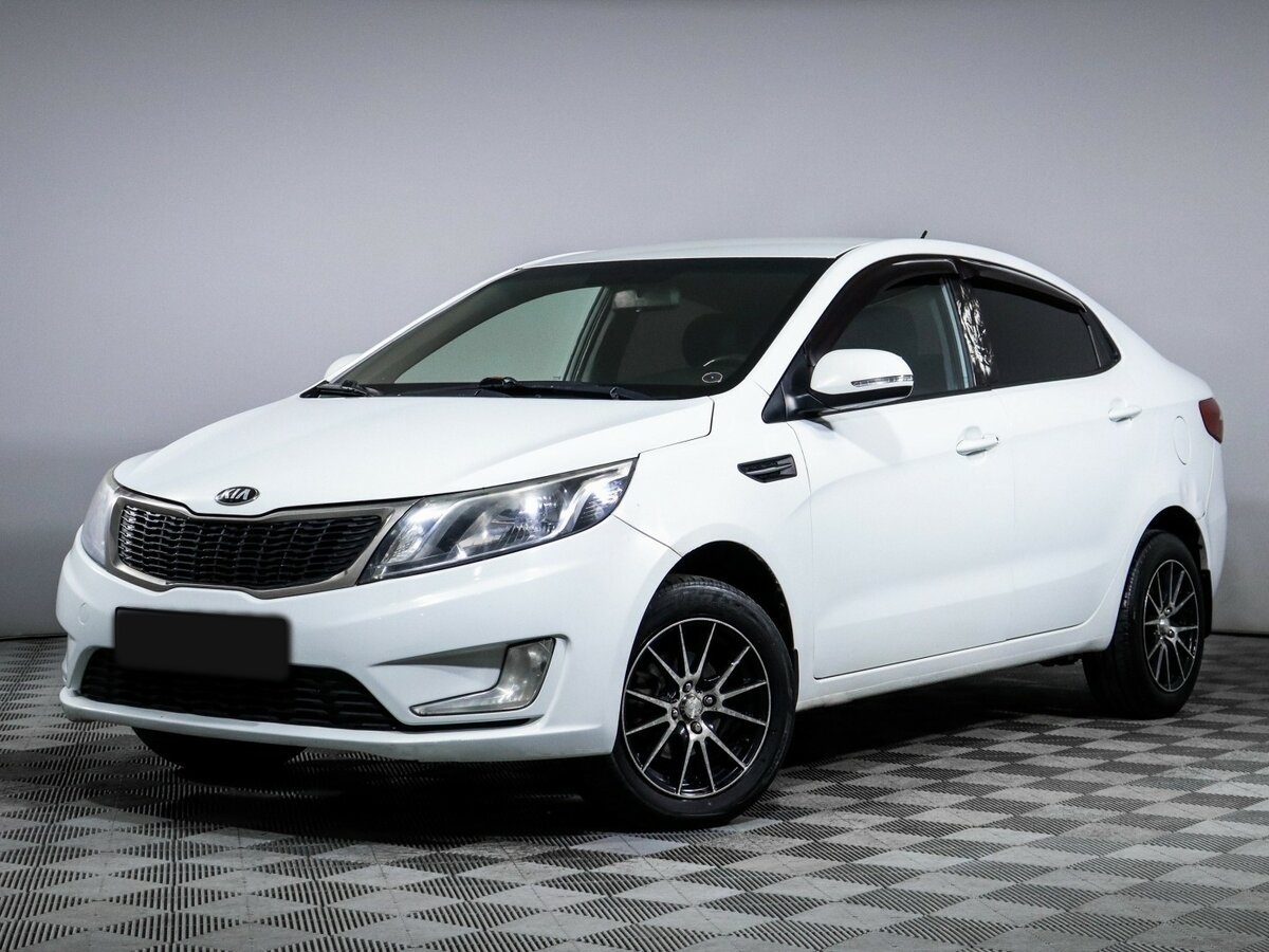 Kia Rio с пробегом — 2013 год. Посмотреть фото