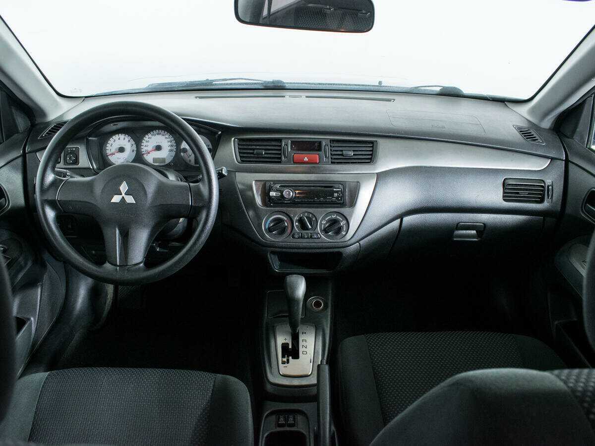 Mitsubishi Lancer с пробегом — 2009 год. Фото: #11