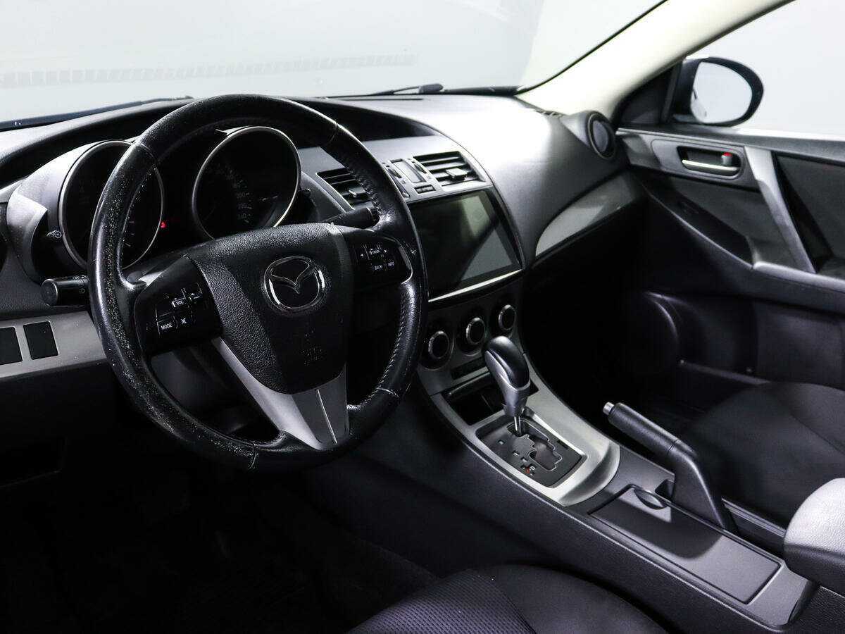 Mazda 3 с пробегом — 2011 год. Фото: #13