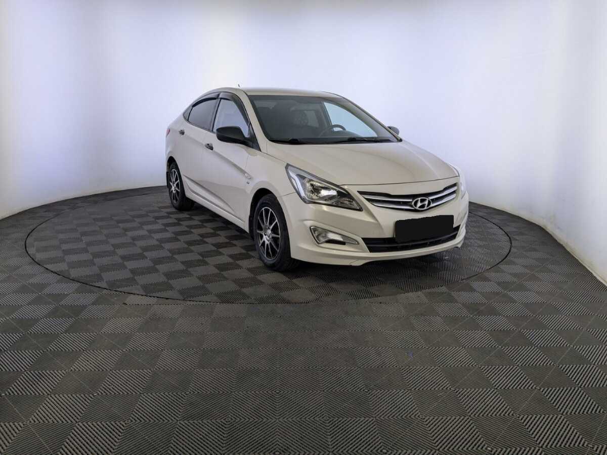 Hyundai Solaris с пробегом — 2015 год. Фото: #2