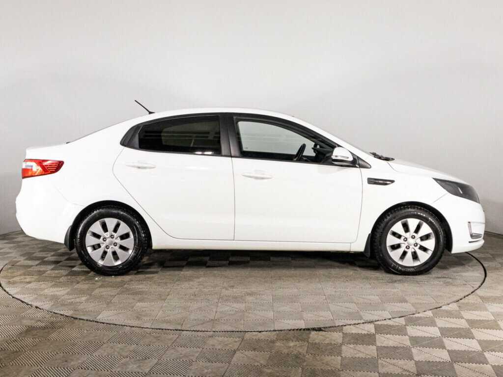 Kia Rio с пробегом — 2011 год. Фото: #3