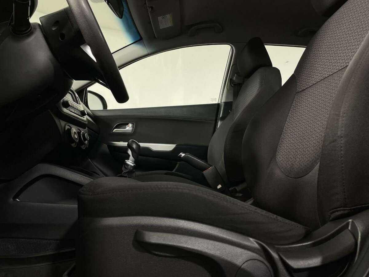 Kia Rio с пробегом — 2013 год. Фото: #9
