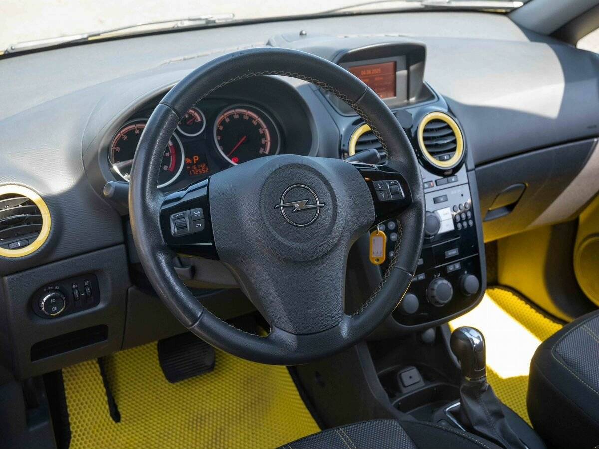 Opel Corsa с пробегом — 2011 год. Фото: #11