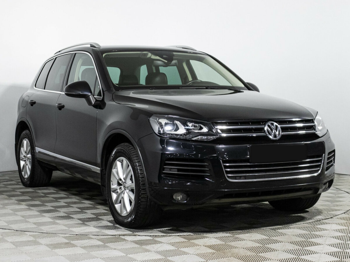 Volkswagen Touareg с пробегом — 2014 год. Фото: #2