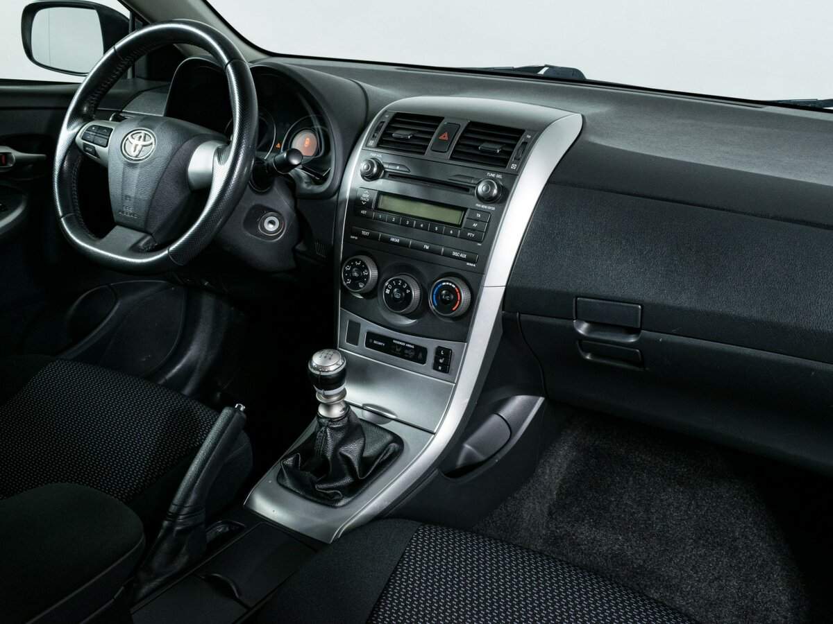 Toyota Corolla с пробегом — 2011 год. Фото: #7